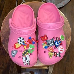 Pink Crocs with Charms included